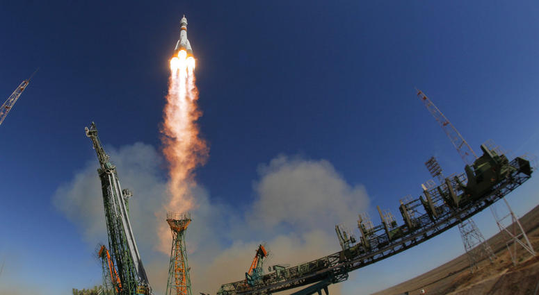 The Soyuz-FG rocket booster with Soyuz MS-10 space ship carrying a new crew to the International Space Station