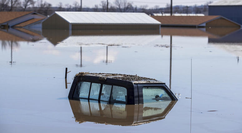Chris Machian/Omaha World-Herald via AP