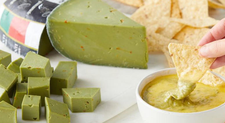 A wedge of green guacamole cheese from Dairy Dairy of Holland