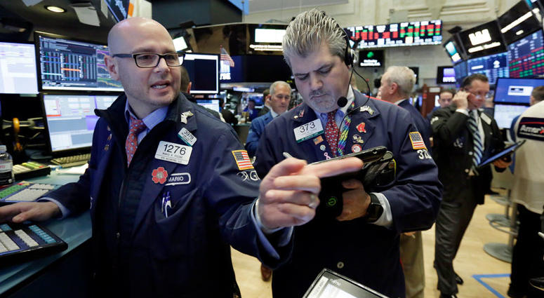 Specialist Mario Picone, left, works at his post on the floor of the New York Stock Exchange, Thursday, May 3, 2018. U.S. stocks are falling Thursday morning as the market continues a sell-off that began late the previous day. Specialist Mario Picone, left, works at his post on the floor of the New York Stock Exchange, Thursday, May 3, 2018. U.S. stocks are falling Thursday morning as the market continues a sell-off that began late the previous day.