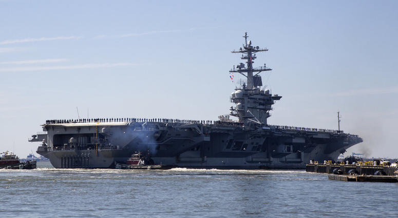 USS Abraham Lincoln the USS Abraham Lincoln deploys from Naval Station Norfolk