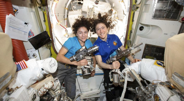 U.S. astronauts Jessica Meir, left, and Christina Koch pose for a photo in the International Space Station U.S. astronauts Jessica Meir, left, and Christina Koch pose for a photo in the International Space Station