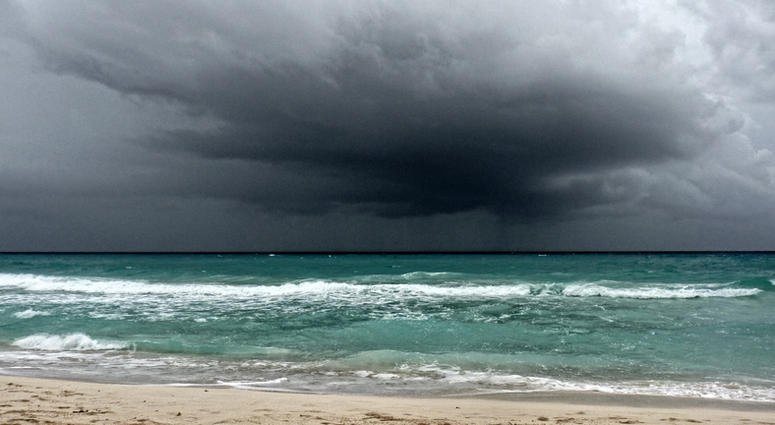 View of a storm on the ocean View of a storm on the ocean