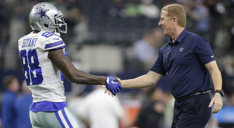 Dallas Cowboys wide receiver Dez Bryant (88) shakes hands with head coach Jason Garrett before a game Dallas Cowboys wide receiver Dez Bryant (88) shakes hands with head coach Jason Garrett before a game