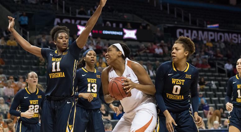 NCAA Womens Basketball: Big 12 Conference Tournament Texas Longhorns forward Jatarie White (40) pulls up to shoot against West Virginia Mountaineers forward Teana Muldrow (11) during the fourth quarter during the women's Big 12 Conference Tournament at Chesapeake Energy Arena.
