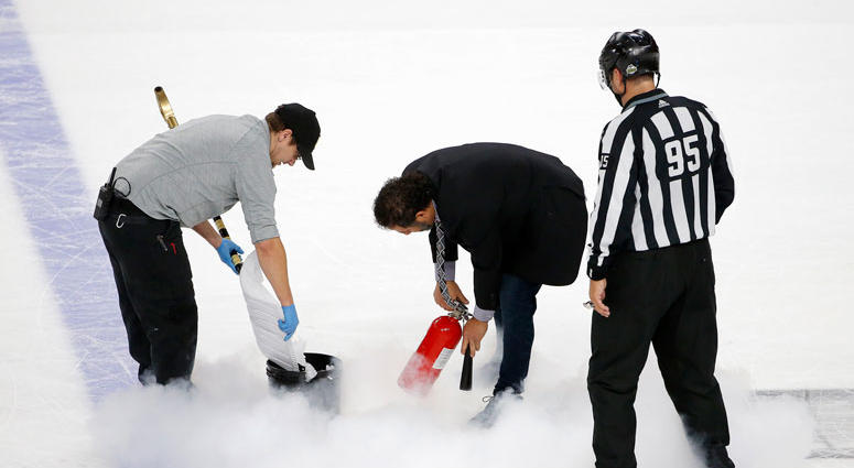 Ice maintenance crew members repair the ice during the third period in Game 1 of the NHL hockey Stanley Cup Finals between the Vegas Golden Knights and the Washington Capitals Ice maintenance crew members repair the ice during the third period in Game 1 of the NHL hockey Stanley Cup Finals between the Vegas Golden Knights and the Washington Capitals