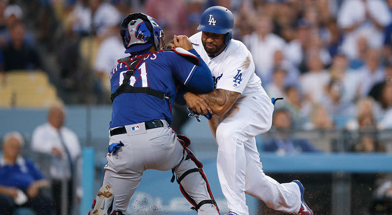 Los Angeles Dodgers' Matt Kemp, right, shoves Texas Rangers catcher Robinson Chirinos Los Angeles Dodgers' Matt Kemp, right, shoves Texas Rangers catcher Robinson Chirinos