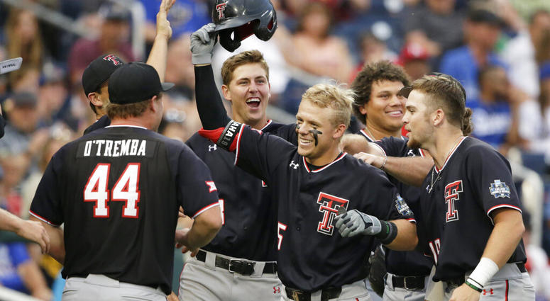 Texas Tech CWS Texas Tech's Brian Klein, third from right, celebrates his solo home run against Florida State in the sixth inning of an NCAA College World Series