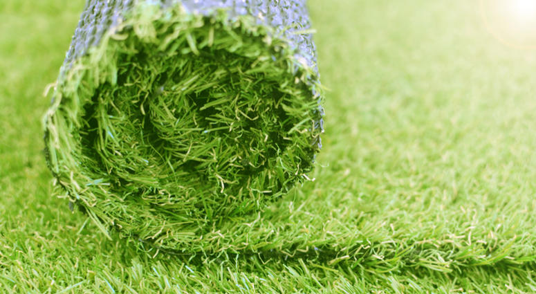 Artificial turf roll. Synthetic grass Artificial turf roll. Synthetic grass