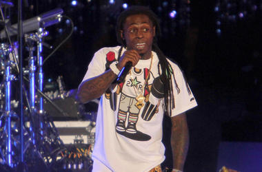 1 March 2012 - Hollywood, California - Lil Wayne. Caesars Entertainment Kick-Off Of "Escape To Total Rewards" , Los Angeles_Show Held At Hollywood & Highland Center. Photo Credit: Kevan Brooks/AdMedia /Sipa USA