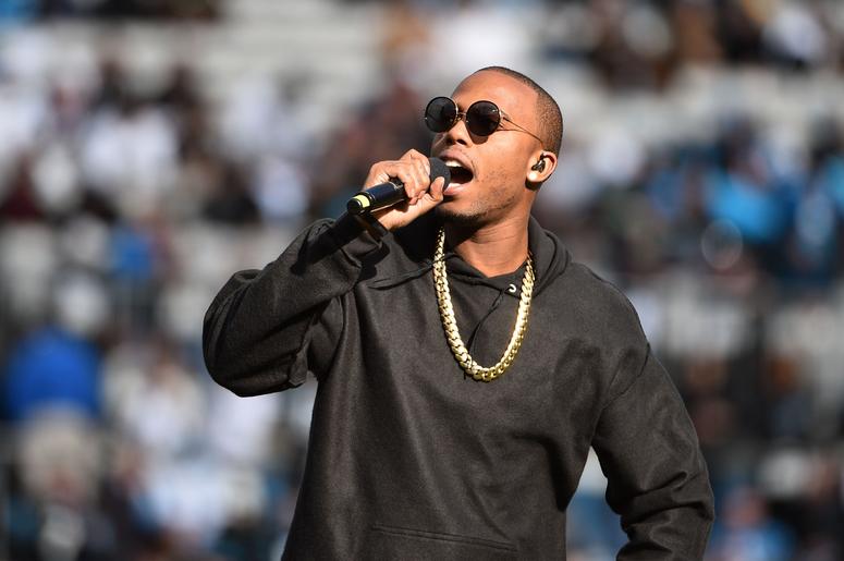 B.o.B performs at halftime of the game between the Seattle Seahawks and the Carolina Panthers B.o.B performs at halftime of the game between the Seattle Seahawks and the Carolina Panthers