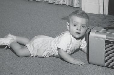 Young John and an old radio Young John and an old radio