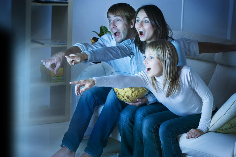 Family watching TV Family watching TV