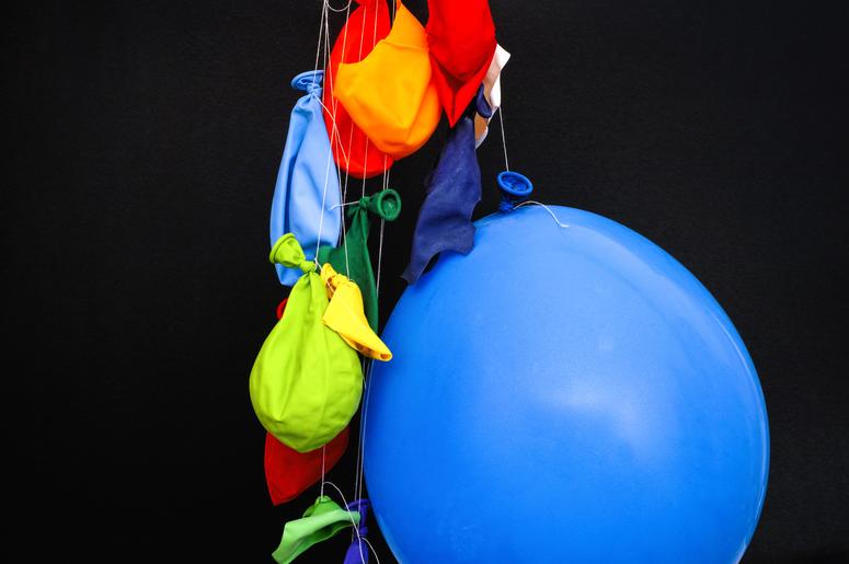 A bunch of deflated balloons