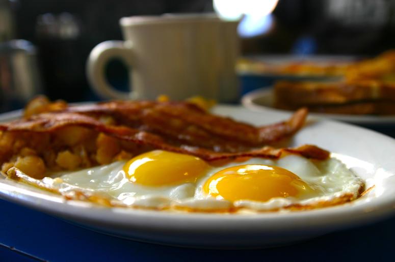 (Parkerla/ iStock/ Getty Images Plus) Eggs and bacon on a plate