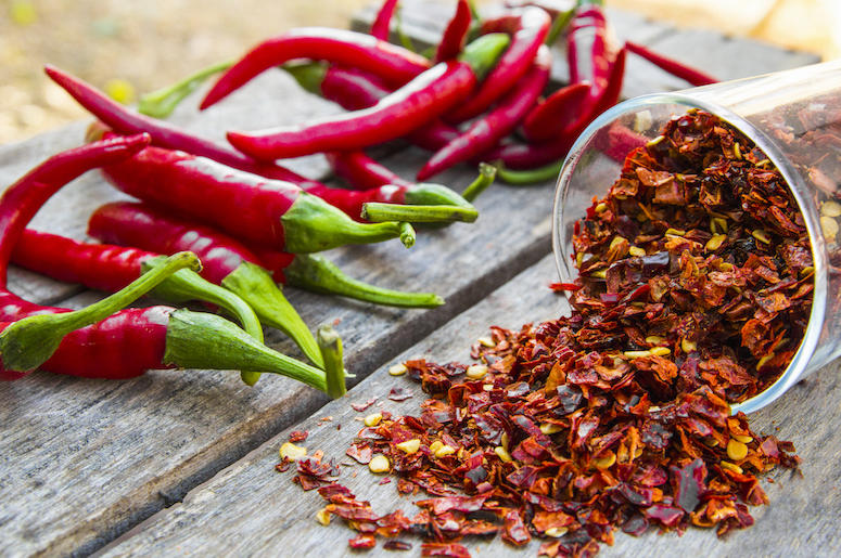 Red Pepper Flakes, Chilis, Wooden Table Red Pepper Flakes, Chilis, Wooden Table