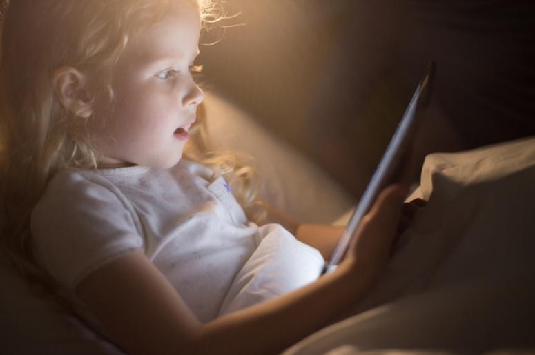 child looking at screen