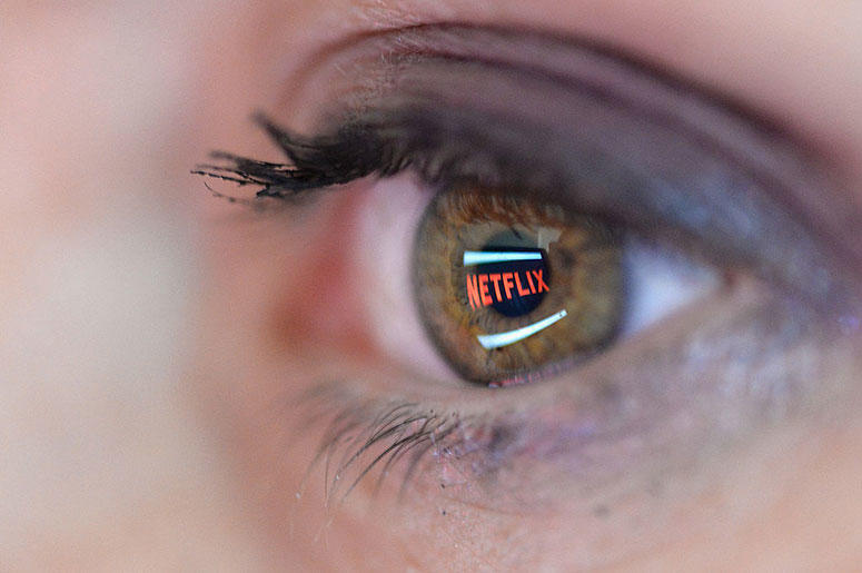 Netflix reflection in woman's eye