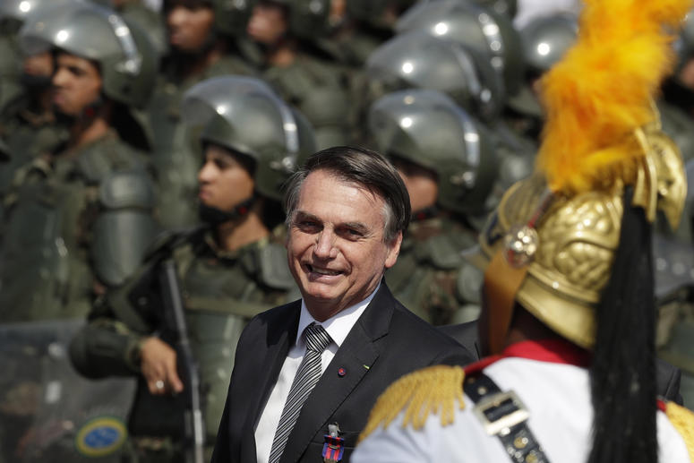 Brazils President Jair Bolsonaro arrive to attend a military ceremony for the Day of the Soldier, at Army Headquarters in Brasilia, Brazil, Friday, Aug. 23, 2019. Brazils President Jair Bolsonaro arrive to attend a military ceremony for the Day of the Soldier, at Army Headquarters in Brasilia, Brazil, Friday, Aug. 23, 2019.