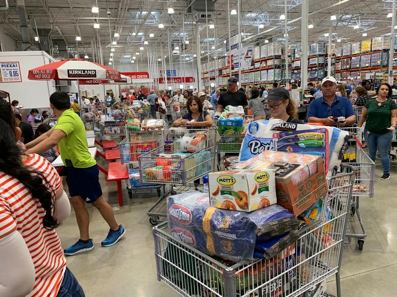 Shoppers wait in long lines at Costco, Thursday, Aug. 29, 2019, in Davie, Fla., as they stock up on supplies ahead of Hurricane Dorian. Hurricane Dorian preparations