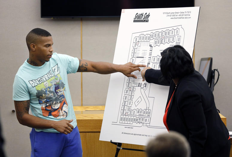 Botham Jean's neighbor Joshua Brown, left, answers questions from Assistant District Attorney LaQuita Long, right, while pointing to a map of the South Side Flats where he lives. Botham Jean's neighbor Joshua Brown, left, answers questions from Assistant District Attorney LaQuita Long, right, while pointing to a map of the South Side Flats where he lives.