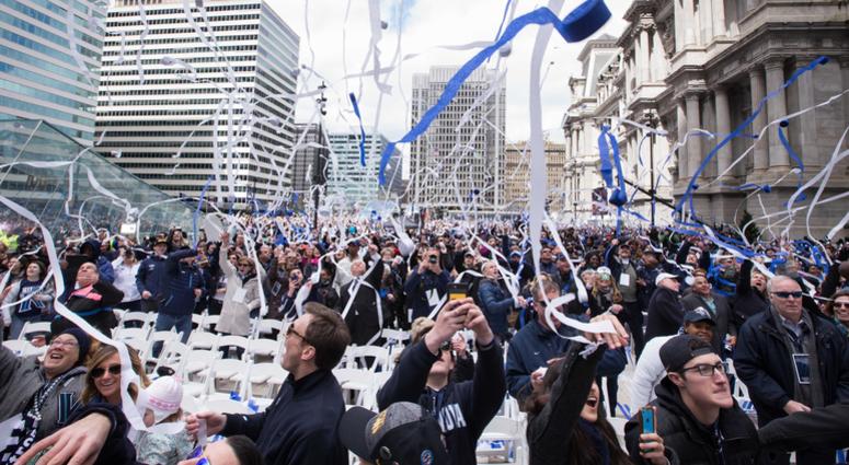 Villanova Wildcats fans throw streamers into the air as they celebrate at the championship parade at Dilworth Park. 2016 Villanova Parade
