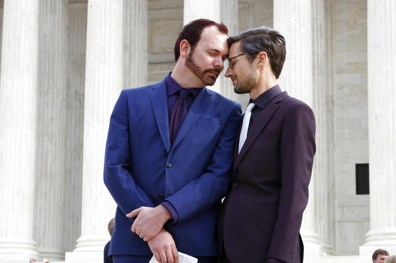 Charlie Craig, left, and David Mullins touch foreheads after leaving the Supreme Court in Washington in 2017. The Supreme Court is setting aside a Colorado court ruling against a baker who wouldn’t make a wedding cake for the same-sex couple. Charlie Craig, left, and David Mullins touch foreheads after leaving the Supreme Court in Washington in 2017. The Supreme Court is setting aside a Colorado court ruling against a baker who wouldn’t make a wedding cake for the same-sex couple.