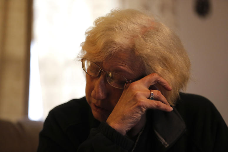Kim Mincks reacts inside her home in Gonzalez, La., Sunday, Jan. 27, 2019, where two of her housemates, Keith Theriot and his wife Elizabeth Theriot, were killed in another room yesterday while she slept. Kim Mincks reacts inside her home in Gonzalez, La., Sunday, Jan. 27, 2019, where two of her housemates, Keith Theriot and his wife Elizabeth Theriot, were killed in another room yesterday while she slept.