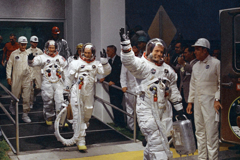 FILE - In this July 16, 1969 file photo, from right, Neil Armstrong, Michael Collins and Buzz Aldrin walk to the van that will take the crew to the launchpad at Kennedy Space Center on Merritt Island, Florida. FILE - In this July 16, 1969 file photo, from right, Neil Armstrong, Michael Collins and Buzz Aldrin walk to the van that will take the crew to the launchpad at Kennedy Space Center on Merritt Island, Florida.