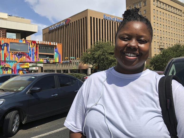 Infinity Tucker, an El Paso native who identifies as Afro-Latina, spoke about Sunday’s shooting in El Paso. “He’s a grown man,” the 23-year-old said of the suspected killer. “He’s able to make his own choices.” In this Aug. 4, 2019, photo, Infinity Tucker poses in El Paso, Texas.