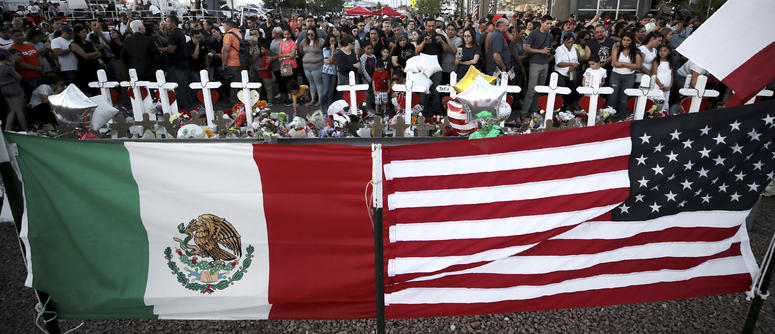 People show up in masses Monday, Aug. 5, 2019, to pay their respects to those who lost their lives in Saturday's attack in El Paso, Texas. People show up in masses Monday, Aug. 5, 2019, to pay their respects to those who lost their lives in Saturday's attack in El Paso, Texas.