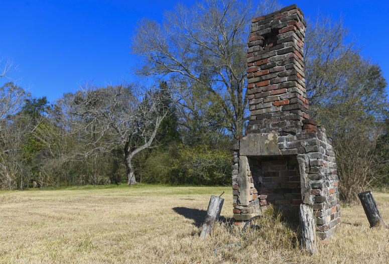 A chimney, the last remaining original structure from the days when survivors of the Clotilda, the last known slave ship brought into the United States, inhabited the area, stands in an abandoned lot in Africatown in Mobile, Ala. A chimney, the last remaining original structure from the days when survivors of the Clotilda, the last known slave ship brought into the United States, inhabited the area, stands in an abandoned lot in Africatown in Mobile, Ala.