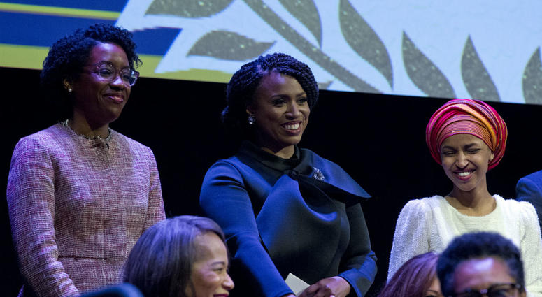 From left, Lauren Underwood D-IL, Ayanna Pressley, D-Mass., and Ilhan Omar D-MN, during the swearing-in ceremony of Congressional Black Caucus members of the 116th Congress at The Warner Theatre in Washington, Thursday, Jan. 3, 2019. From left, Lauren Underwood D-IL, Ayanna Pressley, D-Mass., and Ilhan Omar D-MN, during the swearing-in ceremony of Congressional Black Caucus members of the 116th Congress at The Warner Theatre in Washington, Thursday, Jan. 3, 2019.