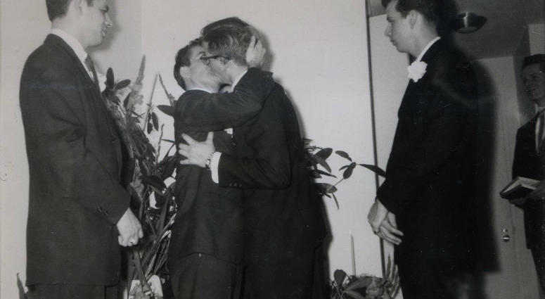 LGBT archivists in Philadelphia and California are trying to identify two men photographed on their wedding day at a time when gay marriage was considered taboo.