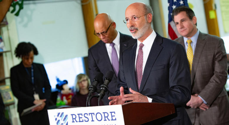 Gov. Tom Wolf speaks at Taggart School on March 21, 2019, proposing his severance tax on natural gas to fund the removal of lead paint and asbestos in Philly schools. Gov. Tom Wolf
