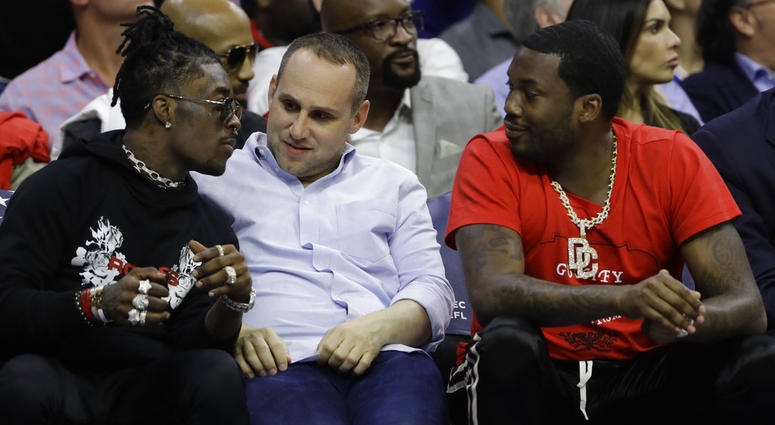Philadelphia 76ers' co-owner Michael Rubin, center, talks with rappers Lil Uzi Vert, left, and Meek Mill during the first half of Game 4 of an NBA basketball second-round playoff series against the Boston Celtics in Philadelphia. Philadelphia 76ers' co-owner Michael Rubin, center, talks with rappers Lil Uzi Vert, left, and Meek Mill during the first half of Game 4 of an NBA basketball second-round playoff series against the Boston Celtics in Philadelphia.