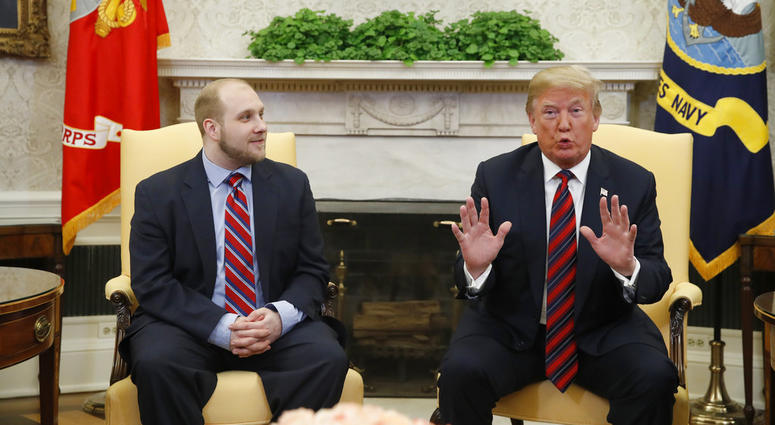 President Donald Trump, right, talks as Joshua Holt, who was recently released from a prison in Venezuela, joins him in the Oval Office of the White House. President Donald Trump, right, talks as Joshua Holt, who was recently released from a prison in Venezuela, joins him in the Oval Office of the White House.