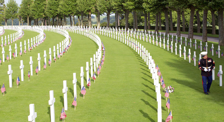 A U.S. Marine Corps soldier visits graves prior to a Memorial Day commemoration at the Aisne-Marne American Cemetery in Belleau, France. A U.S. Marine Corps soldier visits graves prior to a Memorial Day commemoration at the Aisne-Marne American Cemetery in Belleau, France.