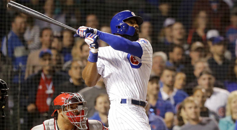 Chicago Cubs' Jason Heyward swings through his game-winning grand slam off Philadelphia Phillies relief pitcher Adam Morgan during the ninth inning. Chicago Cubs' Jason Heyward swings through his game-winning grand slam off Philadelphia Phillies relief pitcher Adam Morgan during the ninth inning.