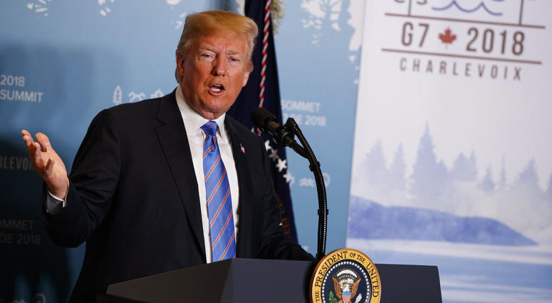 President Donald Trump speaks during a news conference at the G-7 summit, Saturday, June 9, 2018, in La Malbaie, Quebec, Canada. G7 Summit