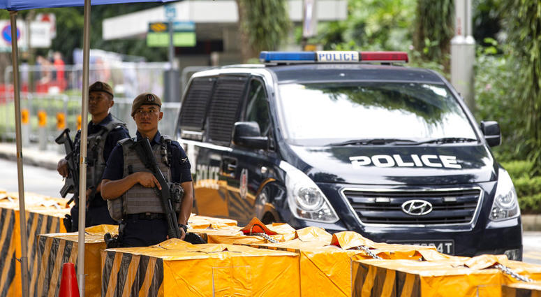 Gurkha police officers stand guard outside the St. Regis Hotel in Singapore, Sunday, June 10, 2018, ahead of the summit between U.S. President Donald Trump and North Korean leader Kim Jong Un. Gurkha police officers stand guard outside the St. Regis Hotel in Singapore, Sunday, June 10, 2018, ahead of the summit between U.S. President Donald Trump and North Korean leader Kim Jong Un.