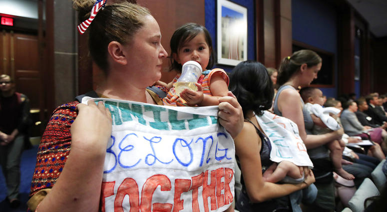 Lucy Martin and her daughter Branwen Espinal together with other mothers and their babies, attend a House Committee hearing to express their support and sympathy to immigrants and their families. Lucy Martin and her daughter Branwen Espinal together with other mothers and their babies, attend a House Committee hearing to express their support and sympathy to immigrants and their families.