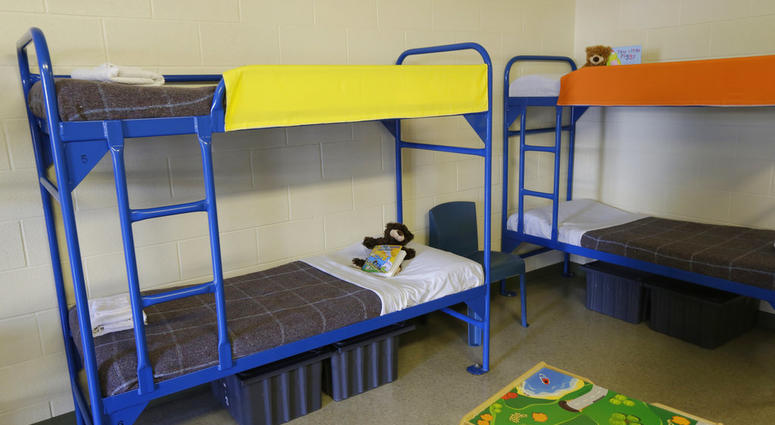 Bunk beds are seen at the Karnes County Residential Center in Karnes City, Texas. The immigration detention facility has been retooled to house adults with children who have been apprehended at the border. Immigration Detainment