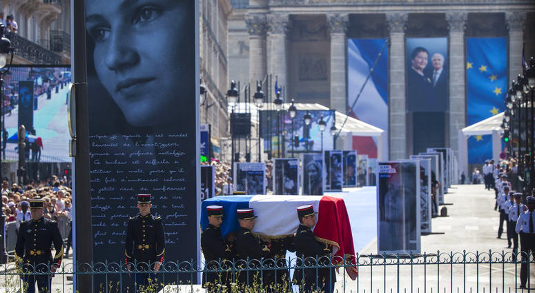 The flag-draped coffin of late Auschwitz holocaust survivor and French health minister Simone Veil, is carried during a national tribute before being laid to rest in the crypt of the Pantheon mausoleum in Paris. The flag-draped coffin of late Auschwitz holocaust survivor and French health minister Simone Veil, is carried during a national tribute before being laid to rest in the crypt of the Pantheon mausoleum in Paris.