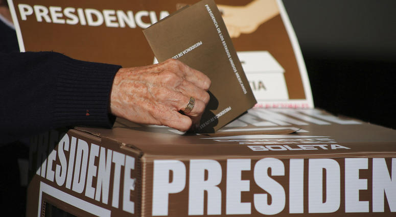 An elderly woman votes for president during general elections in Queretaro, Mexico, Sunday, July 1, 2018. An elderly woman votes for president during general elections in Queretaro, Mexico, Sunday, July 1, 2018.