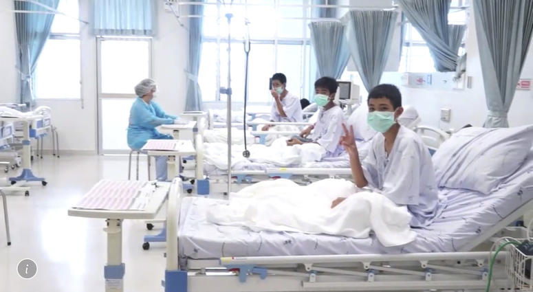 Three of the 12 boys are seen recovering in their hospital beds after being rescued along with their coach from a flooded cave in Mae Sai, Chiang Rai province, northern Thailand. Three of the 12 boys are seen recovering in their hospital beds after being rescued along with their coach from a flooded cave in Mae Sai, Chiang Rai province, northern Thailand.