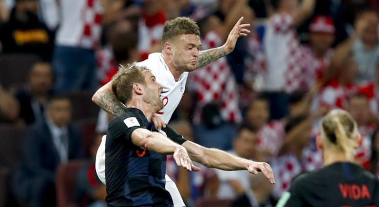 England's Kieran Trippier, right, challenges for the ball with Croatia's Ivan Strinic during the semifinal match between Croatia and England at the 2018 soccer World Cup in the Luzhniki Stadium. England's Kieran Trippier, right, challenges for the ball with Croatia's Ivan Strinic during the semifinal match between Croatia and England at the 2018 soccer World Cup in the Luzhniki Stadium.