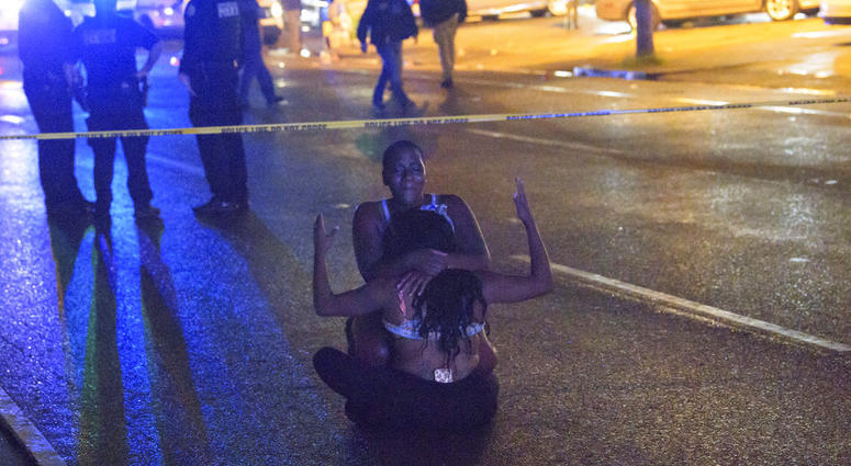 People react at the scene of a shooting in New Orleans, Saturday, July 28, 2018. People react at the scene of a shooting in New Orleans, Saturday, July 28, 2018.