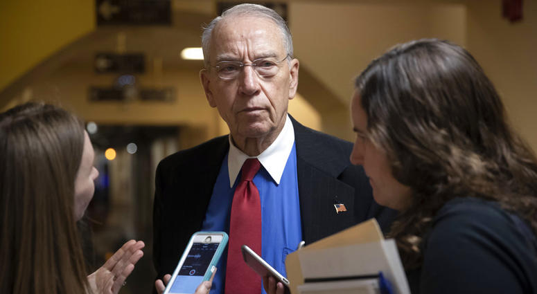In this May 24, 2018, file photo, Senate Judiciary Committee Chairman Chuck Grassley, R-Iowa, speaks to reporters on Capitol Hill in Washington. In this May 24, 2018, file photo, Senate Judiciary Committee Chairman Chuck Grassley, R-Iowa, speaks to reporters on Capitol Hill in Washington.