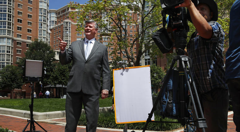 Attorney Kevin Downing, left, gestures to the rest of the defense team for Paul Manafort, as the team leaves federal court for a lunch break during the trial of the former Trump campaign chairman, in Alexandria, Va., Thursday, Aug. 9, 2018. Attorney Kevin Downing, left, gestures to the rest of the defense team for Paul Manafort, as the team leaves federal court for a lunch break during the trial of the former Trump campaign chairman, in Alexandria, Va., Thursday, Aug. 9, 2018.